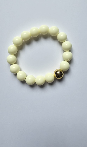 Elegant Ivory Beaded Bracelet with Gold Accent